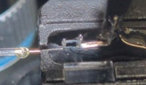 Figure 4 Figure 4. Muscle fiber attached to hardware using glue or in some cases nail polish. (Photo courtesy of Nishikawa Lab, NAU)